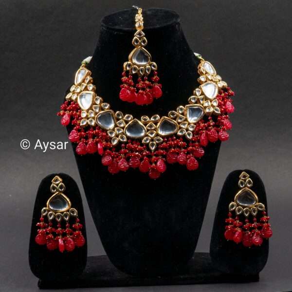 Bridal kundan set with red small cheer beads with earrings and maang tikka dark red colour - Image 3