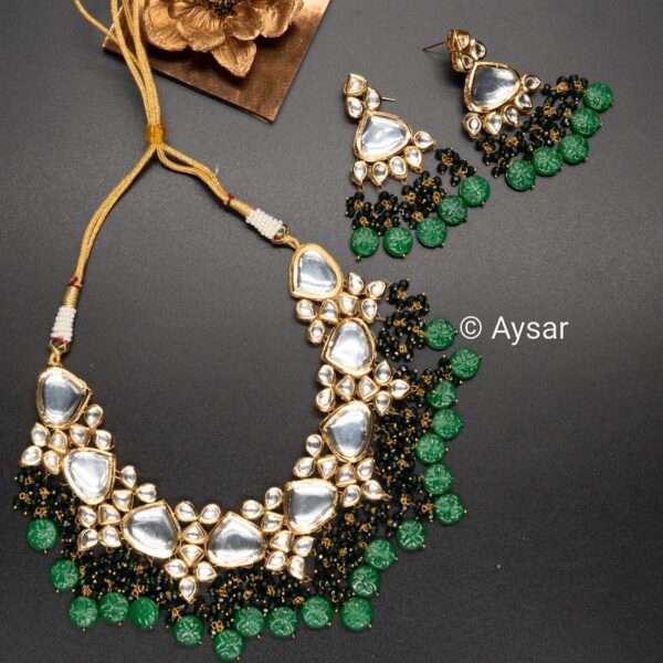 Bridal kundan set with small beads along with earrings and maang teeka big size dark green colour